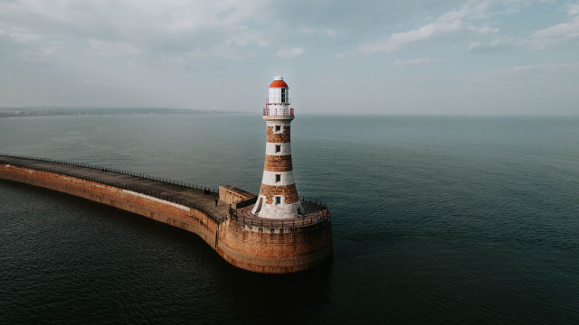 Lighthouse ocean cloudy sky tilt free wallpaper - medium preview image