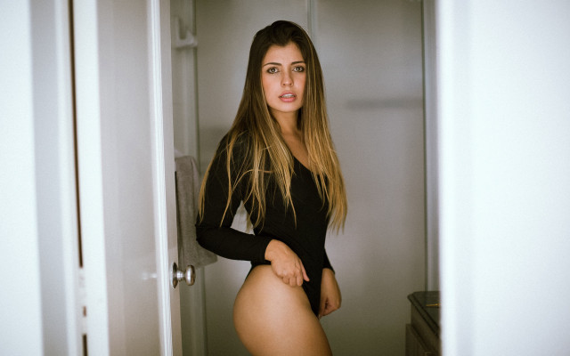 Woman black bodysuit doorway briana free wallpaper - medium preview image