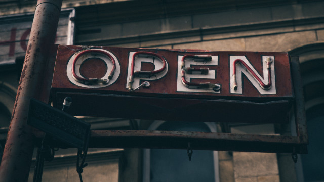 Open sign pole clock building free wallpaper - medium preview image