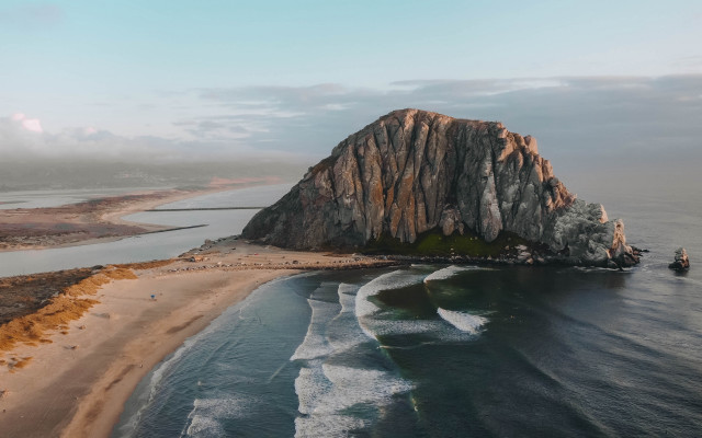Large rock beach ocean boat free wallpaper - medium preview image