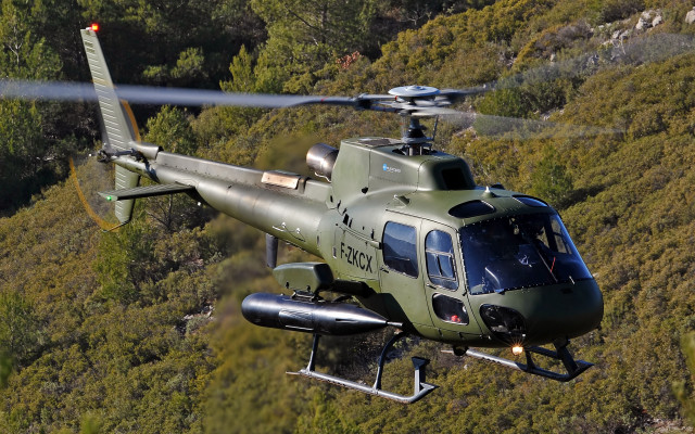 Helicopter greenhills trees bushes light free wallpaper - medium preview image