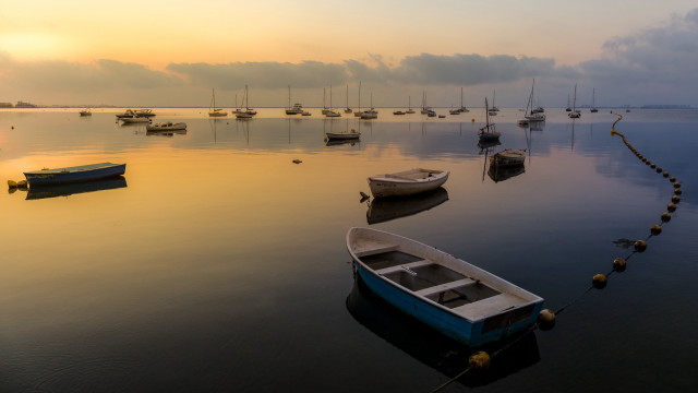 Boats lake sunset clouds tranquil free wallpaper - medium preview image