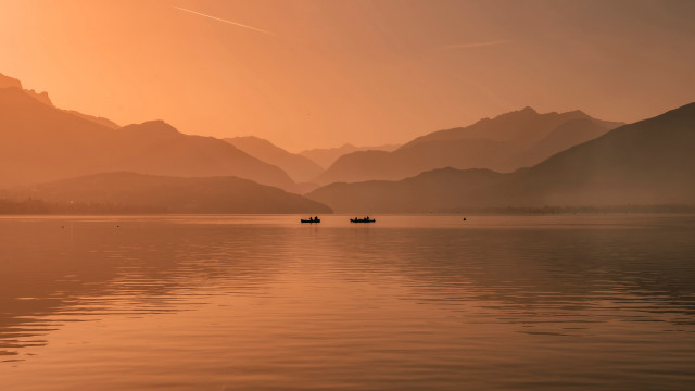 Boats lake sunset mountains clouds free wallpaper - medium preview image