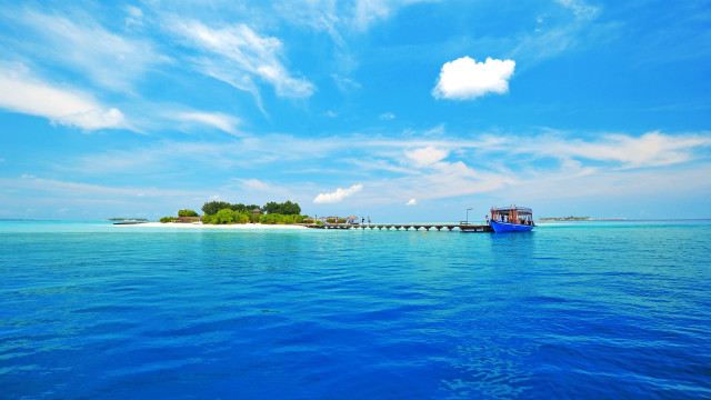 Boat island bridge water sky free wallpaper - medium preview image