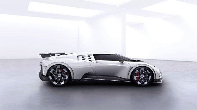 White sports car white room free wallpaper - medium preview image