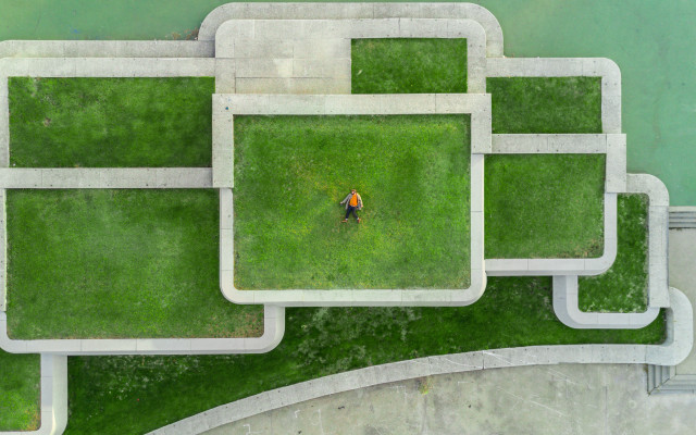 Man walking park green bench free wallpaper - medium preview image