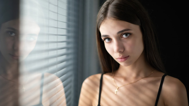 Woman reflection necklace fence portrait free wallpaper - medium preview image