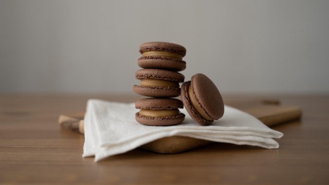 Chocolate macaroons wooden table tilt free wallpaper - medium preview image