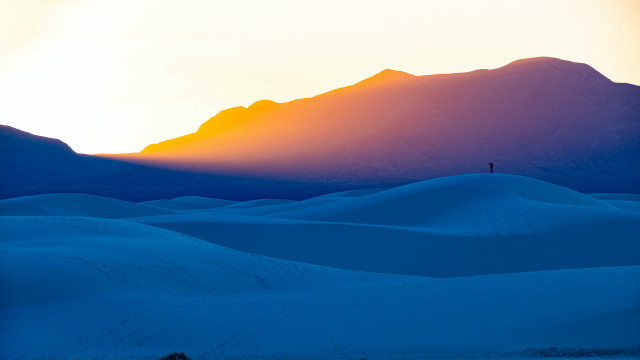Snowy hill sunset mountain ocean free wallpaper - medium preview image