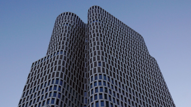 Tall building clock sky modernism free wallpaper - medium preview image