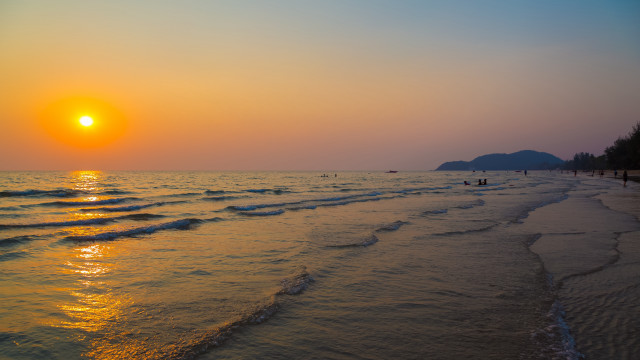 Beach waves sunset mountains matte free wallpaper - medium preview image