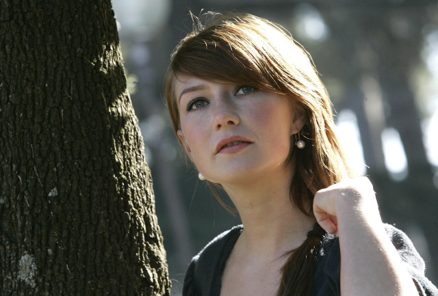 Woman leaning tree hand shoulder free wallpaper - medium preview image
