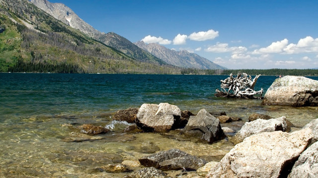 Lake rocks tree mountains clouds free wallpaper - medium preview image
