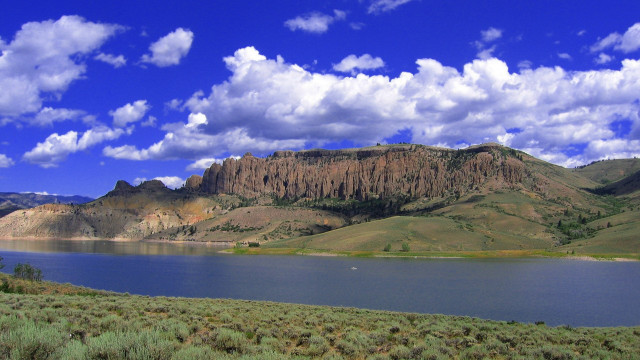 Lake mountains clouds sheep grassland free wallpaper - medium preview image