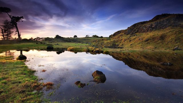 Lake hillside forest sky rock free wallpaper - medium preview image