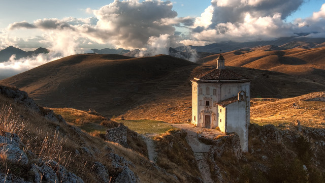 Small building hill cloudy sky free wallpaper - medium preview image