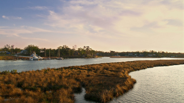 River boat grassy sunset cityscape free wallpaper - medium preview image