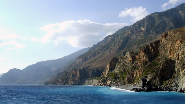 Mountain lake cliff clouds forest free wallpaper - medium preview image