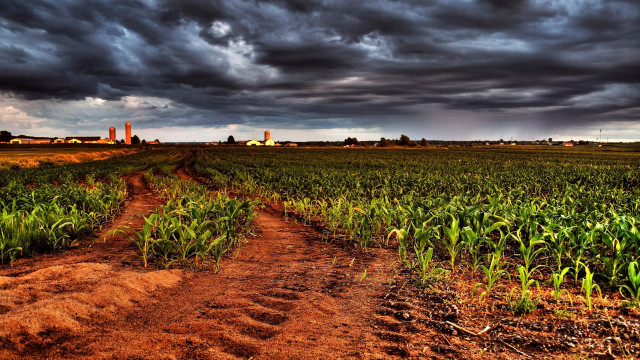 Stormy dirt road cityscape clouds #2 free wallpaper - medium preview image