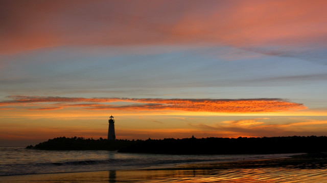 Lighthouse island ocean sunset red free wallpaper - medium preview image