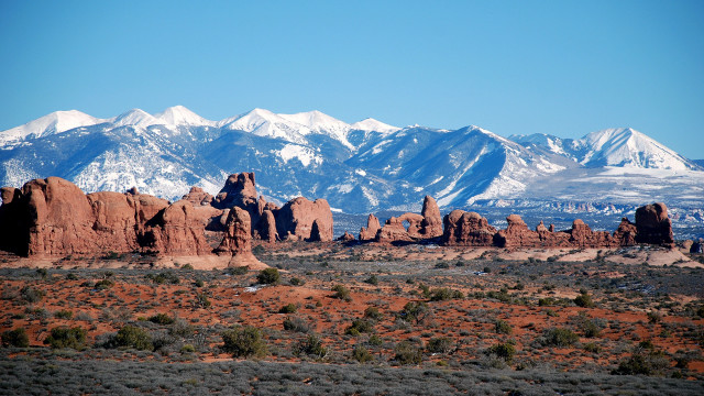 Snowy mountains blue sky campfire free wallpaper - medium preview image
