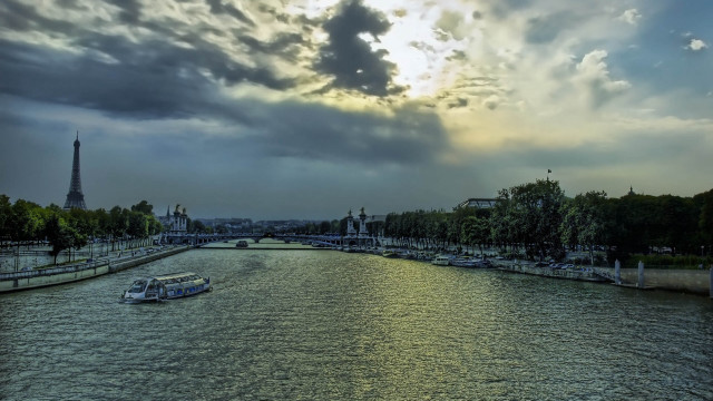 Paris river boat cloudy sky free wallpaper - medium preview image