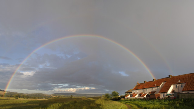 Rainbow rural houses dirtroad grassyfield free wallpaper - medium preview image