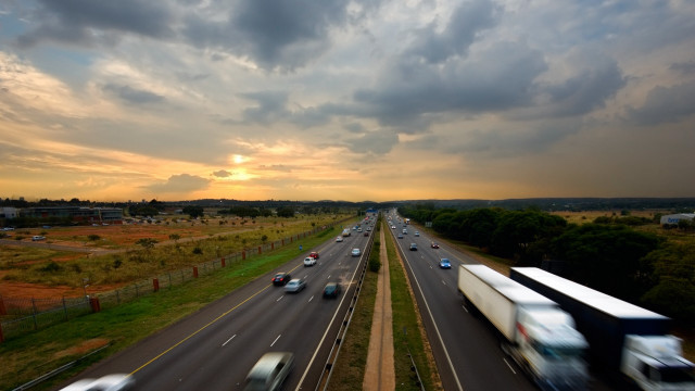 Highway cars sunset cloudy sky free wallpaper - medium preview image