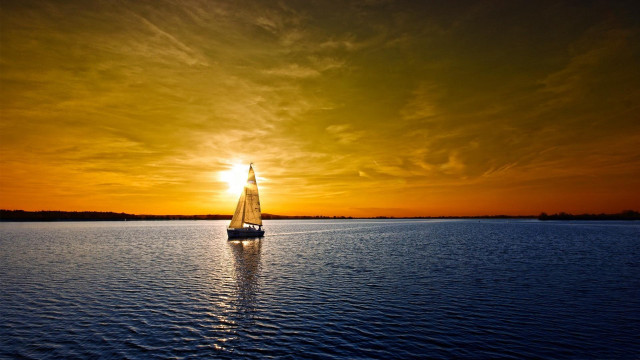 Sailboat sunset beach water reflection free wallpaper - medium preview image
