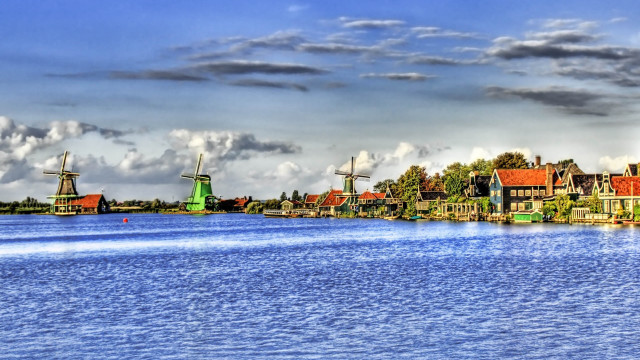 River houses windmills cloudy sky free wallpaper - medium preview image