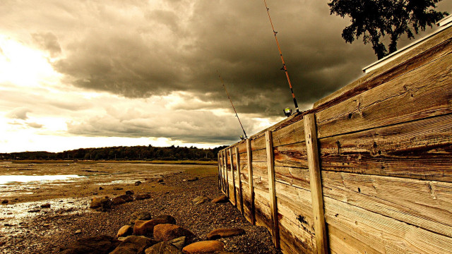 Fishing fence water cloudy sky free wallpaper - medium preview image