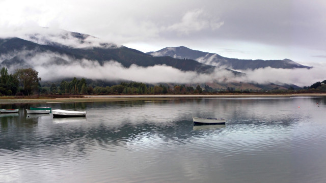 Lake mountains clouds boats reflection free wallpaper - medium preview image