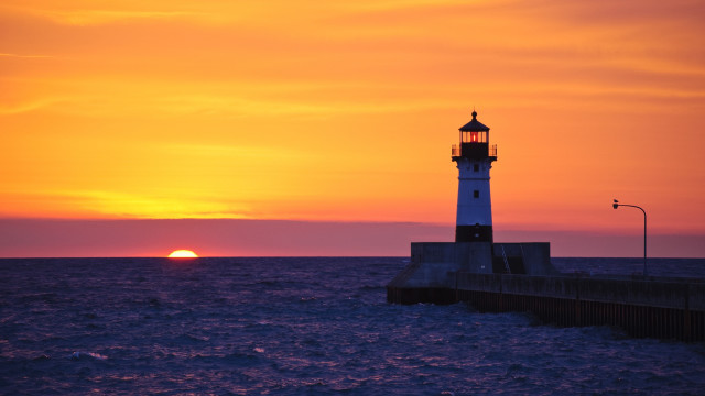 Lighthouse pier sunset water city free wallpaper - medium preview image