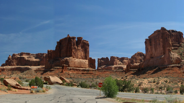 Desert road rock formation stop free wallpaper - medium preview image