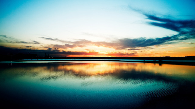 Sunset lake shore person clouds free wallpaper - medium preview image