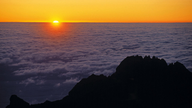 Sunset mountain clouds bird orange free wallpaper - medium preview image
