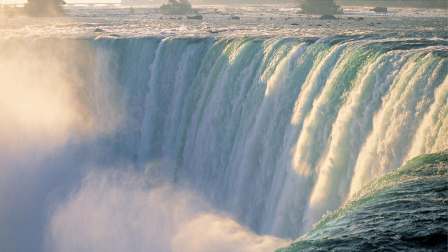 Waterfall boat mountain sunset ocean free wallpaper - medium preview image