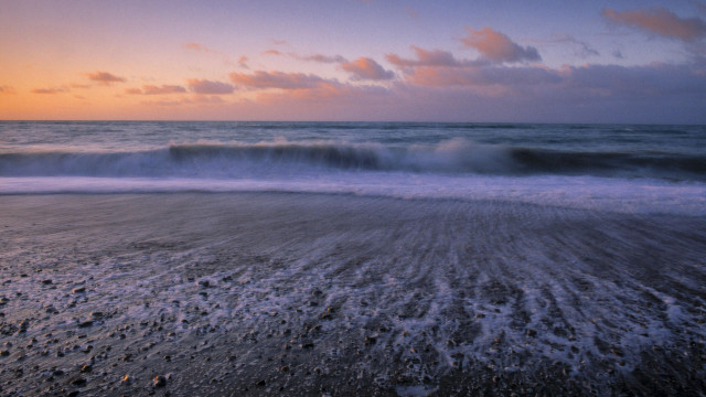 Beach waves sunset clouds tiltshift free wallpaper - medium preview image