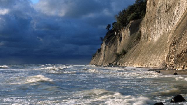 Cliff waves stormy cloudy beach free wallpaper - medium preview image