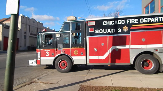 Fire truck parked street sign free wallpaper - medium preview image