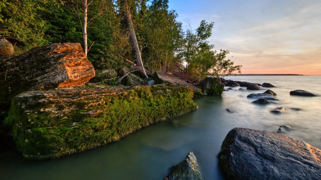 Rocky shore trees water sunset free wallpaper - medium preview image