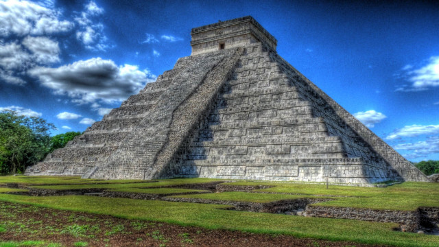 Pyramid grassy field cloudy sky free wallpaper - medium preview image