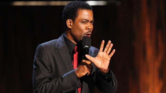 Man suit tie holding microphone free wallpaper - medium preview image