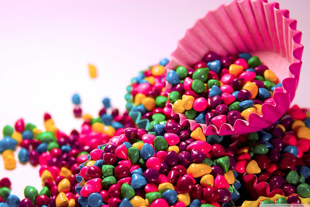 Colorful candy sprinkles white surface free wallpaper - medium preview image