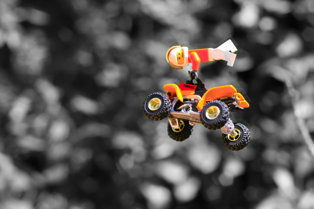 Toy car suspended tree man free wallpaper - medium preview image