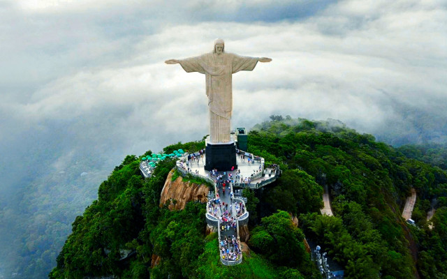 Christ statue mountain clouds trees free wallpaper - medium preview image