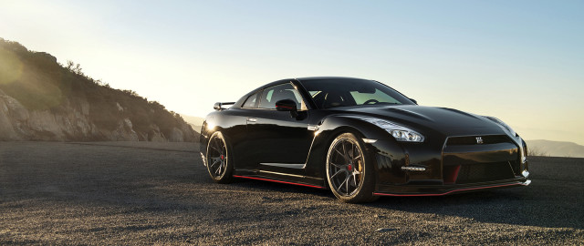 Black sports car dirt road #2 free wallpaper - medium preview image