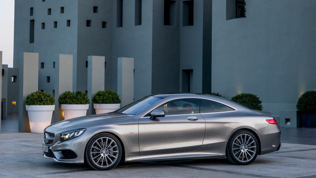 Silver car parked building potted free wallpaper - medium preview image