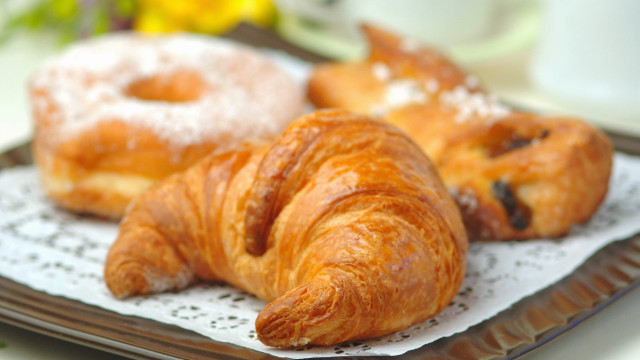Croissants on plate next to free wallpaper - medium preview image