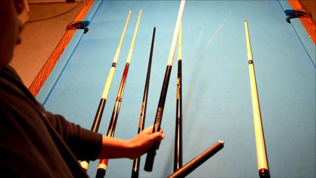 Man holding pool cues pool free wallpaper - medium preview image